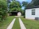 Backyard with covered parking and storage shed at 1639 Silver Star Rd, Orlando, FL 32804