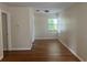 Bright bedroom with hardwood floors and window at 1639 Silver Star Rd, Orlando, FL 32804