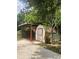 White shed with brown roof in grassy backyard at 1639 Silver Star Rd, Orlando, FL 32804