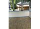 Sunroom with tile floors and backyard view at 1639 Silver Star Rd, Orlando, FL 32804