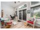 Home office with a view of the backyard, two chairs and desk at 1013 Nin St, Orlando, FL 32835