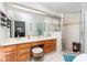 Double vanity bathroom with a large shower and lots of storage at 1013 Nin St, Orlando, FL 32835