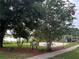 Summer Lakes community features a volleyball court and lake access at 1013 Nin St, Orlando, FL 32835