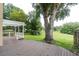 Deck overlooks a large grassy area with mature trees at 1013 Nin St, Orlando, FL 32835