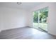 Bedroom with sliding glass doors leading to backyard at 2070 W Airport Blvd, Sanford, FL 32771