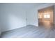 Spacious living room with light grey vinyl flooring at 2070 W Airport Blvd, Sanford, FL 32771