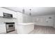 Bright kitchen featuring stainless steel appliances and an island at 2070 W Airport Blvd, Sanford, FL 32771