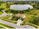 Aerial view of house and lakefront location at 1905 Sanderling Dr, Clermont, FL 34711