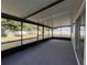 Spacious screened porch overlooking backyard at 7609 Rose Ave, Orlando, FL 32810