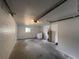 Clean and spacious garage with washer, dryer, and water heater at 7609 Rose Ave, Orlando, FL 32810