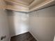 Walk-in closet with shelving and hanging rod at 7609 Rose Ave, Orlando, FL 32810