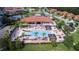 Community pool with spacious deck and surrounding landscaping at 4527 Alberto Cir, Kissimmee, FL 34746