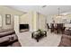 Spacious living room with ample seating and views to dining area at 4527 Alberto Cir, Kissimmee, FL 34746