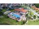 Resort-style pool with a clubhouse and surrounding lounge areas at 4527 Alberto Cir, Kissimmee, FL 34746