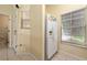 White appliances and wood cabinets in this kitchen at 4527 Alberto Cir, Kissimmee, FL 34746