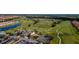 Aerial view of community clubhouse near golf course and residential areas at 2132 Antilles Club Dr, Kissimmee, FL 34747