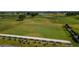 Aerial view of community driving range with multiple tee boxes at 2132 Antilles Club Dr, Kissimmee, FL 34747