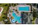 Aerial view of resort-style pool with water features, and lounge areas at 2132 Antilles Club Dr, Kissimmee, FL 34747