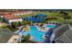 Community pool with water features and lounge areas at 2132 Antilles Club Dr, Kissimmee, FL 34747