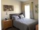 Cozy bedroom with a comfortable bed and ample natural light at 514 Tree Shore Dr, Orlando, FL 32825