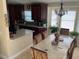 Well-equipped kitchen with dark wood cabinets and granite counters at 514 Tree Shore Dr, Orlando, FL 32825