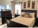 Bright bedroom with double bed, dresser, and nightstand at 514 Tree Shore Dr, Orlando, FL 32825