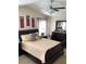 Main bedroom with a sleigh bed and dark wood furniture at 514 Tree Shore Dr, Orlando, FL 32825