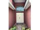 Inviting entryway with double doors and a stained glass window at 514 Tree Shore Dr, Orlando, FL 32825