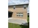 Concrete patio adjacent to the house, ideal for outdoor relaxation at 2531 Lyndscape St, Orlando, FL 32833