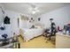 Bedroom with a gaming setup and ceiling fan at 2531 Lyndscape St, Orlando, FL 32833