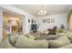 Living room with large sectional sofa and granite floor at 2531 Lyndscape St, Orlando, FL 32833