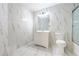 Modern bathroom with marble tile and updated fixtures at 2531 Lyndscape St, Orlando, FL 32833