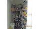 Well-organized pantry with ample shelving at 2531 Lyndscape St, Orlando, FL 32833
