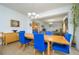 Light and airy dining room with a view of the living room at 2531 Lyndscape St, Orlando, FL 32833