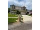Two-story house with a two-car garage and manicured lawn at 2531 Lyndscape St, Orlando, FL 32833