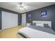 Light and airy bedroom with hardwood floors and ceiling fan at 2531 Lyndscape St, Orlando, FL 32833
