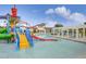 Colorful water playground with slides and sprinklers at 8810 Macapa Dr, Kissimmee, FL 34747