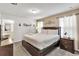 Spacious bedroom with a king-size bed and an ensuite bathroom at 8810 Macapa Dr, Kissimmee, FL 34747