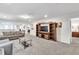 Common area with two sofas, a coffee table, and a large TV at 8810 Macapa Dr, Kissimmee, FL 34747