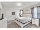 Bright and airy bedroom with a king-size bed and plenty of natural light at 8810 Macapa Dr, Kissimmee, FL 34747