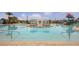 Expansive pool with relaxing seating areas and water features at 8810 Macapa Dr, Kissimmee, FL 34747