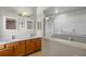 Elegant bathroom with double vanity and large shower at 2635 Quarterdeck Ct, Kissimmee, FL 34743