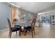 Dining area with round table, four chairs, and tile floors at 2635 Quarterdeck Ct, Kissimmee, FL 34743