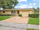 Ranch style home with attached garage at 6809 Ambassador Dr, Orlando, FL 32818