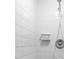 Clean shower with white tile surround at 1404 E Alfred St, Tavares, FL 32778