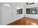 Sunroom with view to backyard and plenty of natural light at 1404 E Alfred St, Tavares, FL 32778