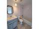 Updated bathroom with subway tile and gray vanity at 5329 Hansel Ave # B-4, Edgewood, FL 32809
