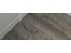 Gray vinyl plank flooring at 5329 Hansel Ave # B-4, Edgewood, FL 32809