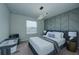 Primary bedroom with modern decor and crib at 4063 Lana Ave, Davenport, FL 33897