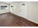 Living room with wood-look floors and plenty of natural light at 613 Alpine St, Altamonte Springs, FL 32701